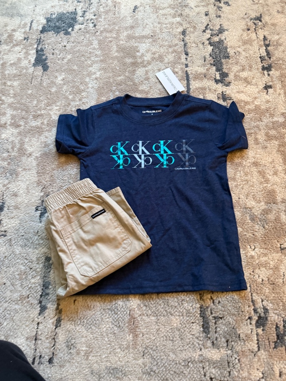 Boys size 6 new Calvin Klein Jeans Navy Tee with Teal & Light Blue CK Logo